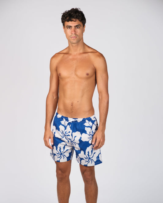 BILLY ALOHA HAZE SWIM TRUNKS. BLUE AND WHITE HIBISCUS PRINT.
